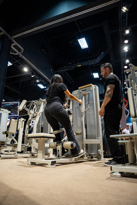 Athlete using the Gluteleader Standing Hip Thrust GL-1004 from the side